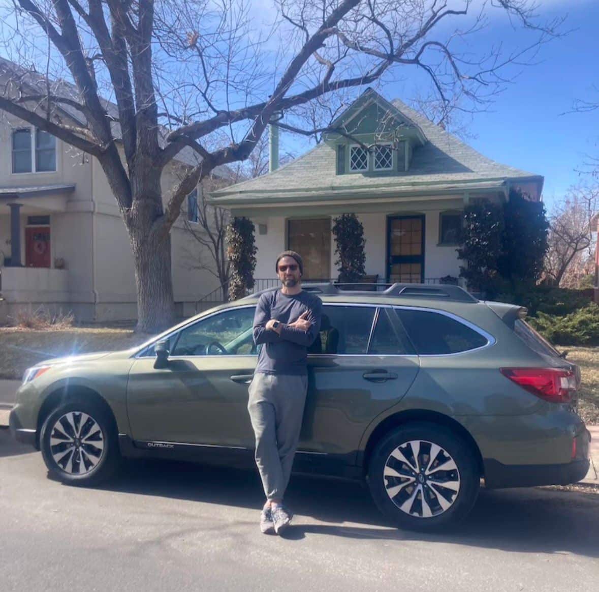 Client with his Subaru Outback at home